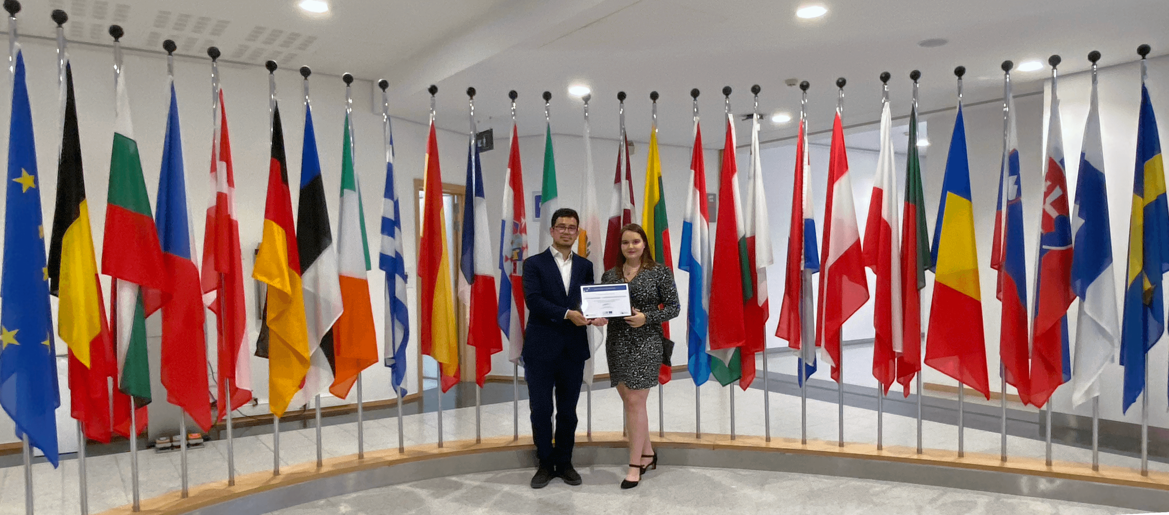 CEC European Managers' certificate of recognition - Flags at the EU Parliament